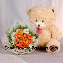 12 Roses oranges avec mignon ours en peluche