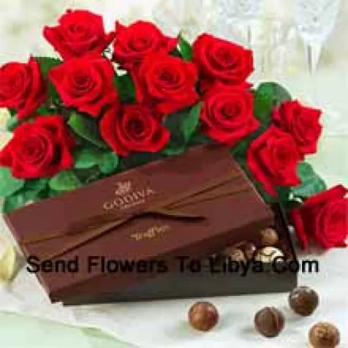 A Beautiful Bunch Of 12 Red Roses With Seasonal Fillers Accompanied With An Imported Box Of Chocolates