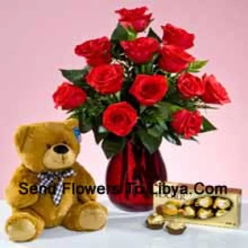 12 Red Roses With Some Ferns In A Glass Vase, A Cute 12 Inches Tall Brown Teddy Bear And A Box Of 16 Pcs Ferrero Rocher Chocolate