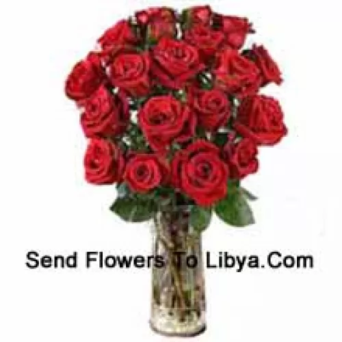 18 Red Roses With Some Ferns In A Vase