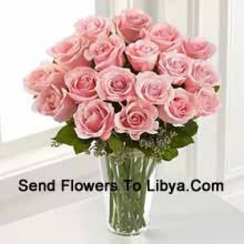 18 Pink Roses With Some Ferns In A Vase