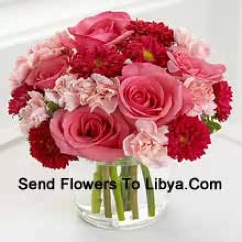 6 Pink Roses, 10 Red Colored Daisies And 10 Pink Colored Carnations In A Glass Vase