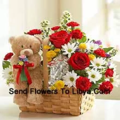 Mandje met Assortiment Bloemen en een schattige bruine teddybeer van 6 inch